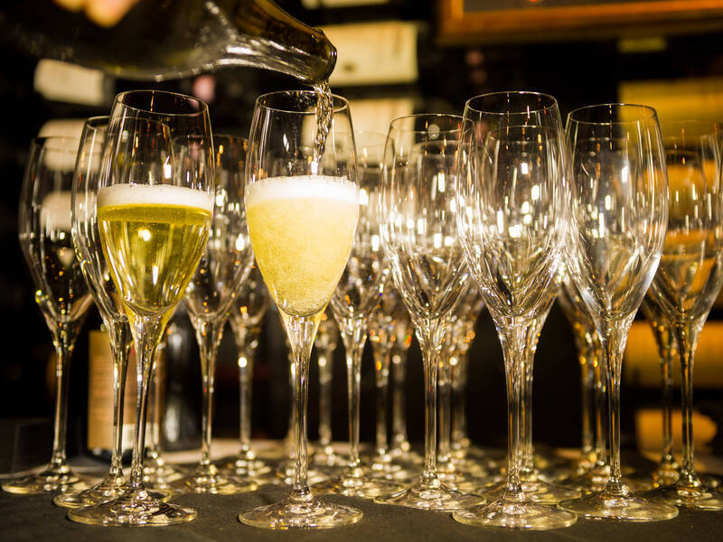 Glasses of Champagne being filled at Whistler Cornucopia